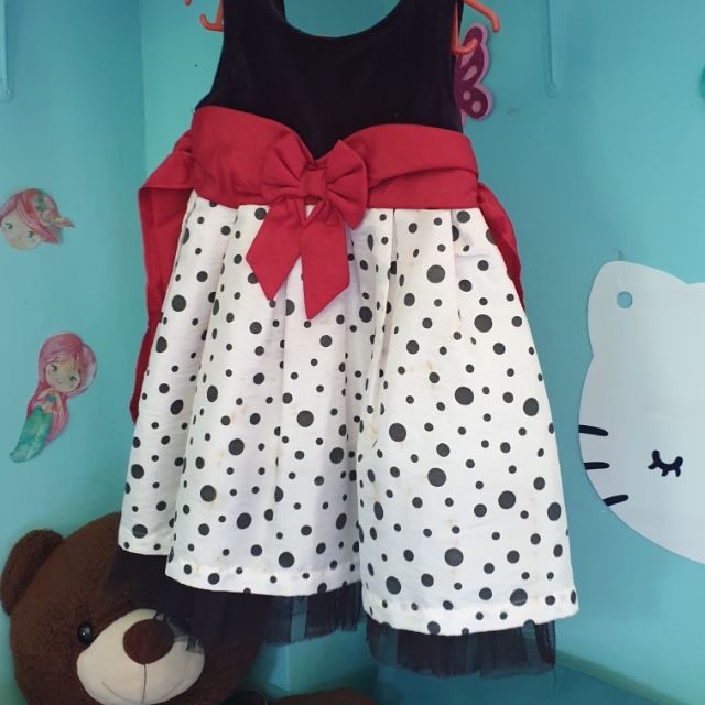 black dress with red ribbon