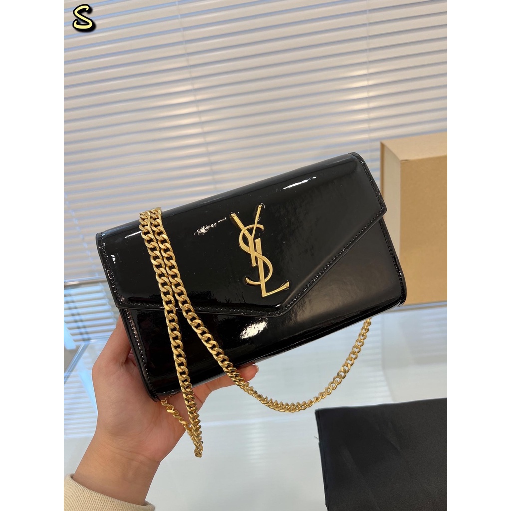 Saint Laurent YSL UTown WOC Mini envelope bag, decorated with metal YSL ...