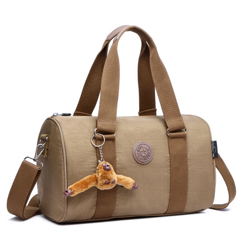 kipling sling bag original vs fake
