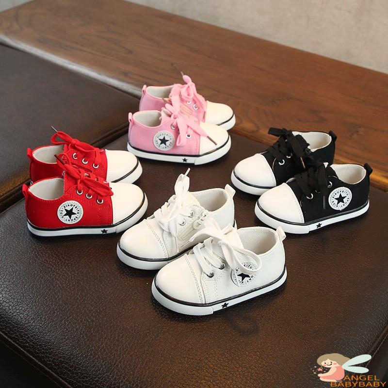 little girl white canvas tennis shoes