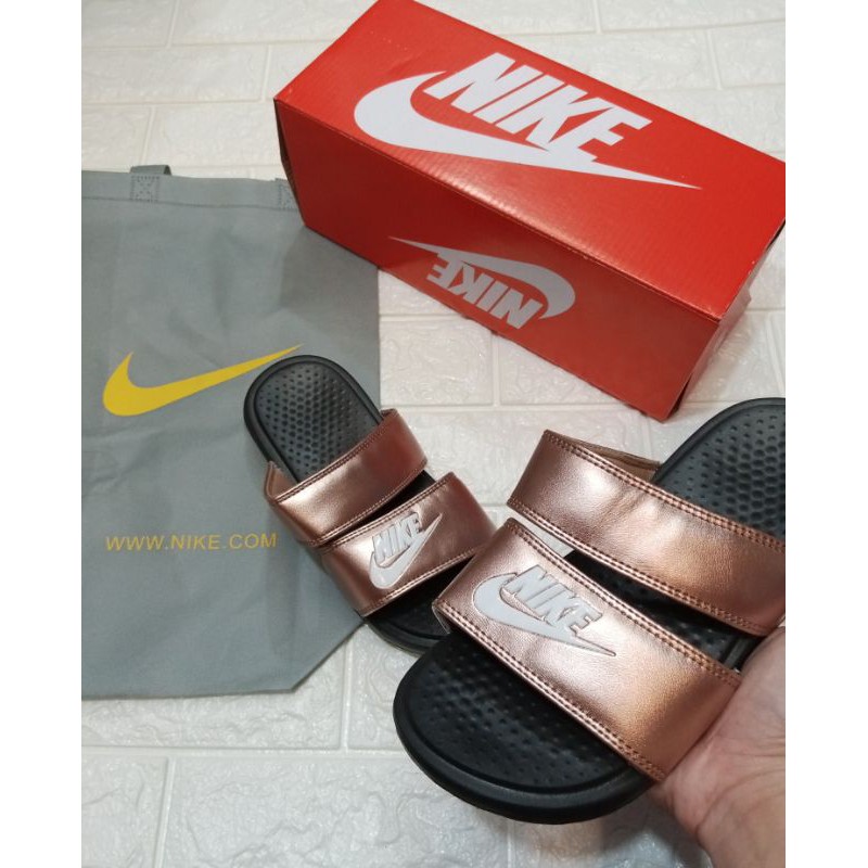 womens nike rose gold slides