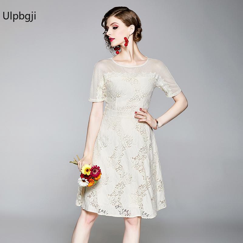 white dress with colorful embroidery
