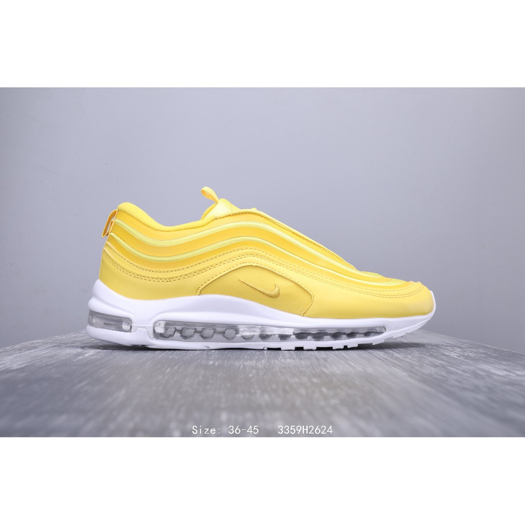 yellow nike running shoes