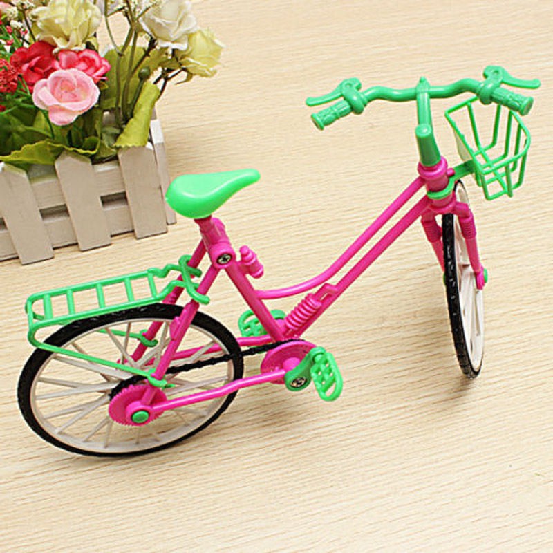 barbie doll and bike