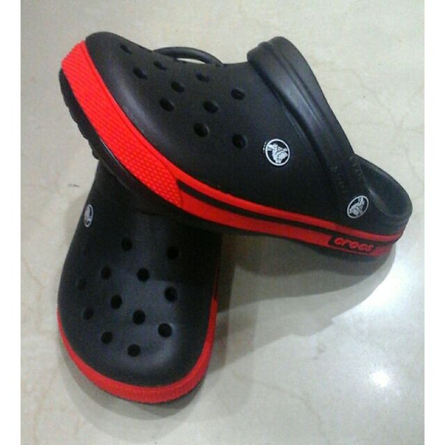 red and black crocs