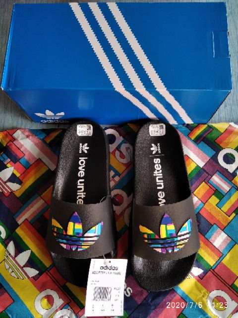 love unites adidas slides