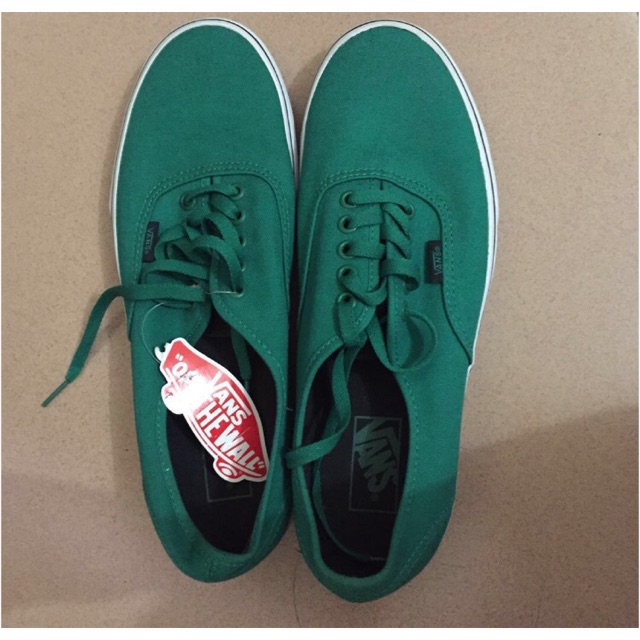 teal green vans