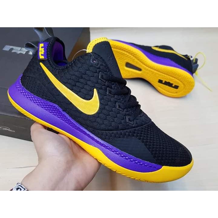 purple and yellow nike shoes