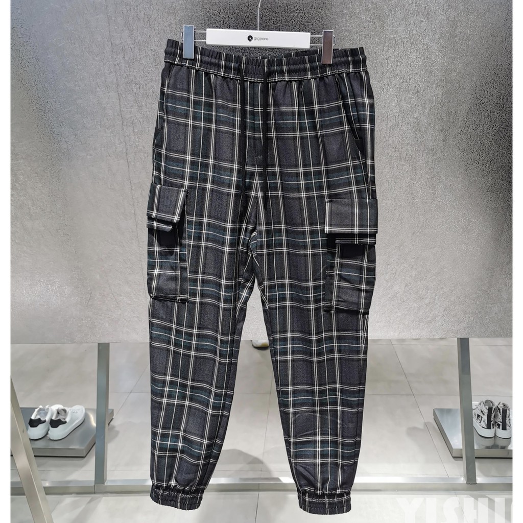 green and black checkered pants