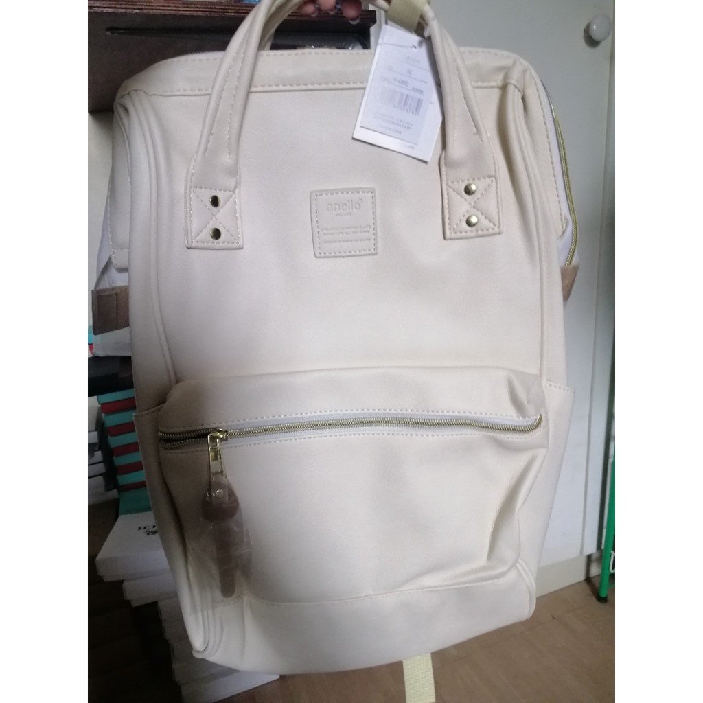 white leather backpack