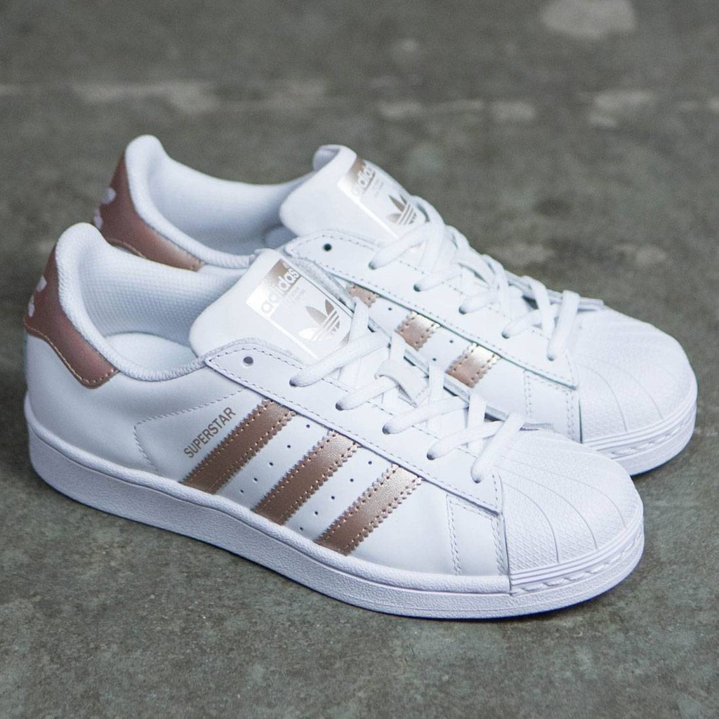 white and rose gold adidas shoes