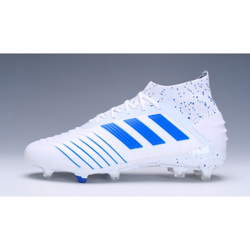 white and blue adidas predator