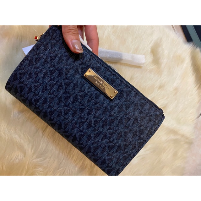 michael kors jet set wallet price