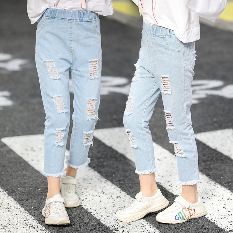 light jeans with holes