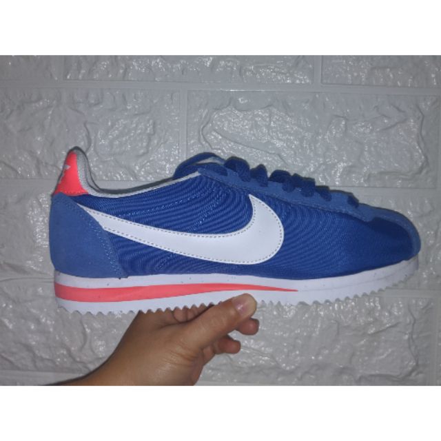 pink and blue nike cortez