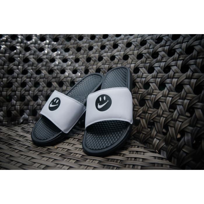 happy face nike slides