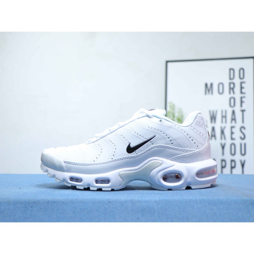 white leather nike tn