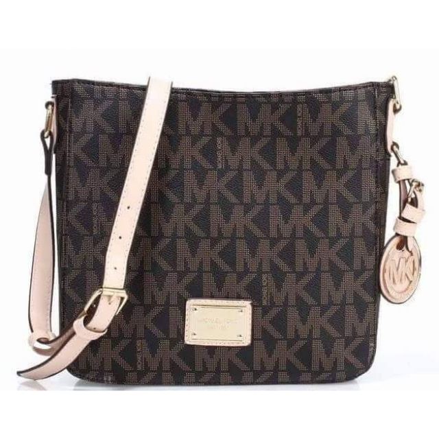 mk sling purse