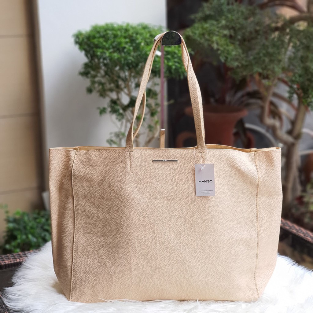 beige leather tote bag