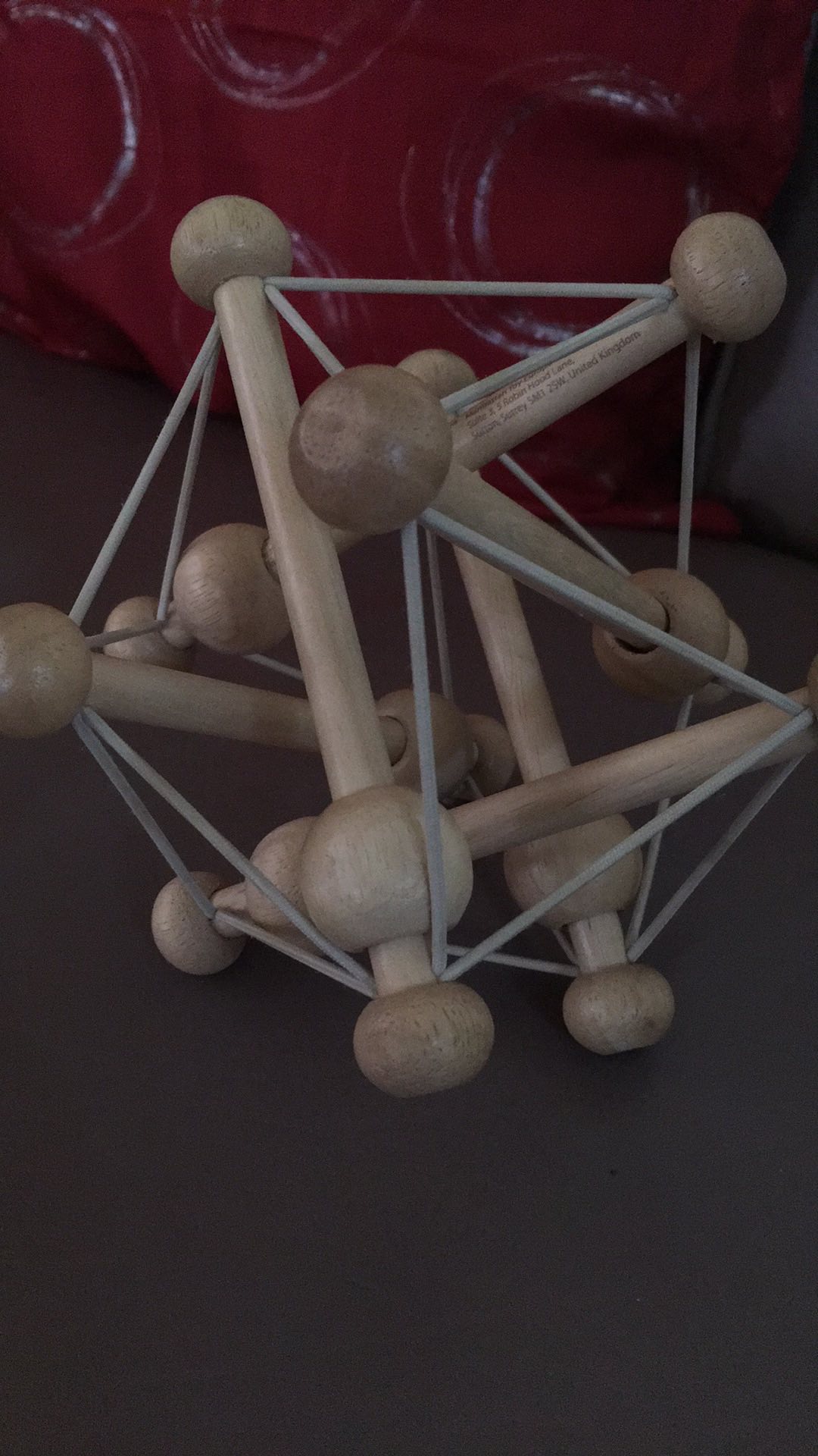 manhattan toy skwish natural rattle and teether grasping activity toy