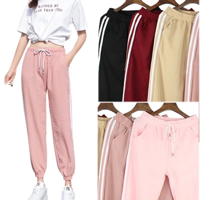 WOMENS TRACK PANTS OR JOGGER PANTS TREND DUAL STRIPES WITH TALE