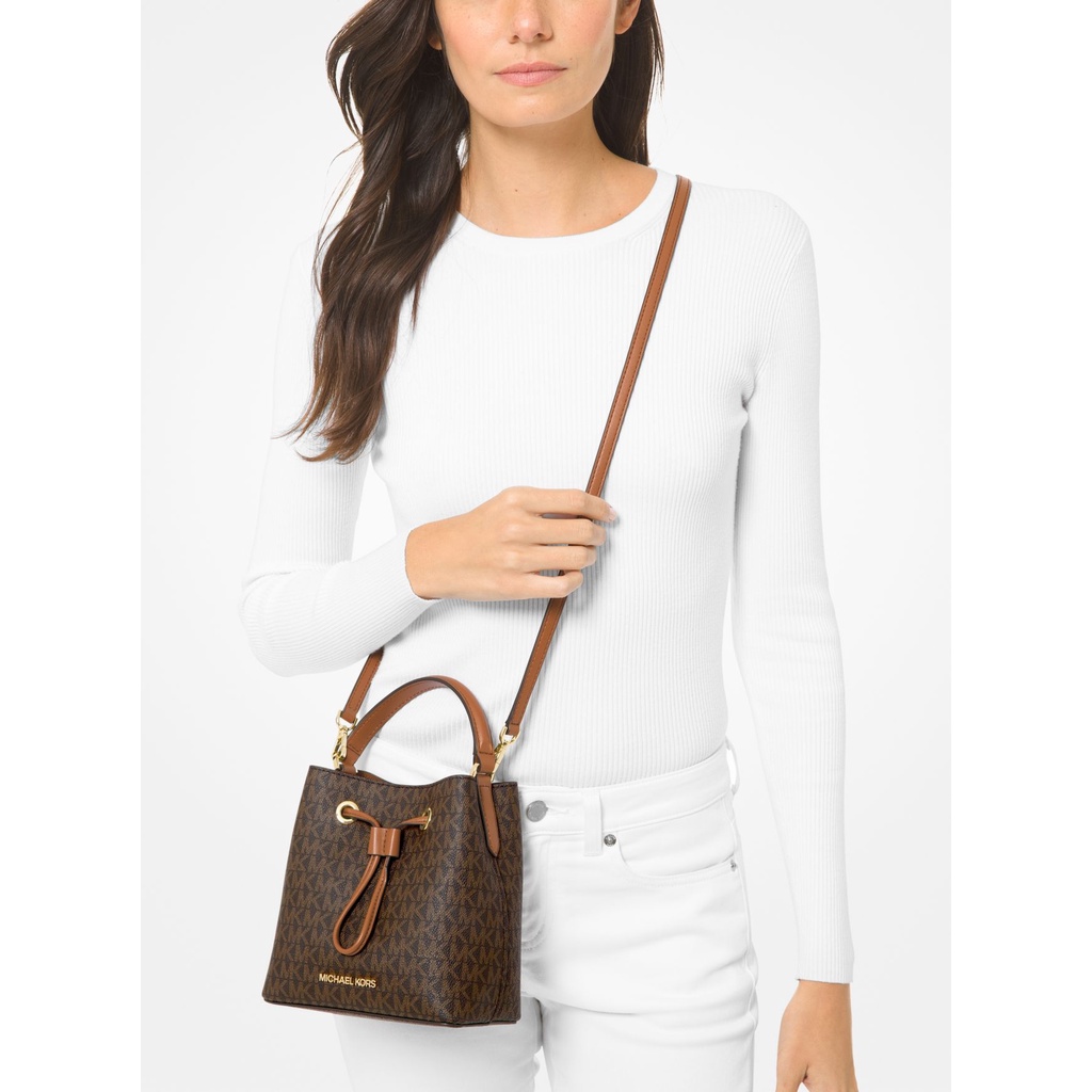 Buy the Michael Kors Suri Small Logo Perforated Suede Crossbody Bag