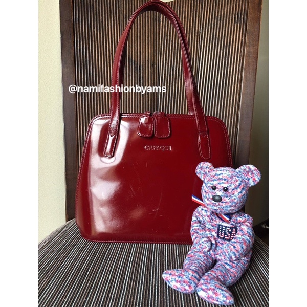 Capacci bag price clearance