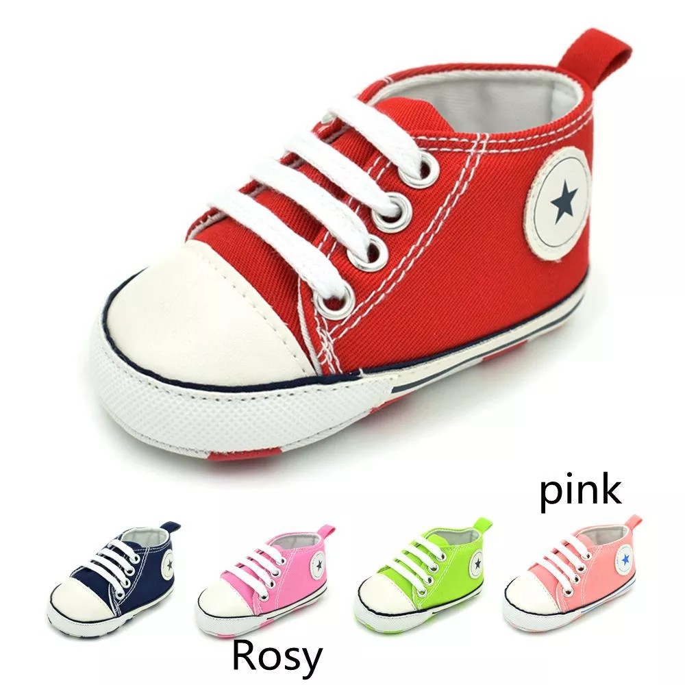 infant white canvas shoes