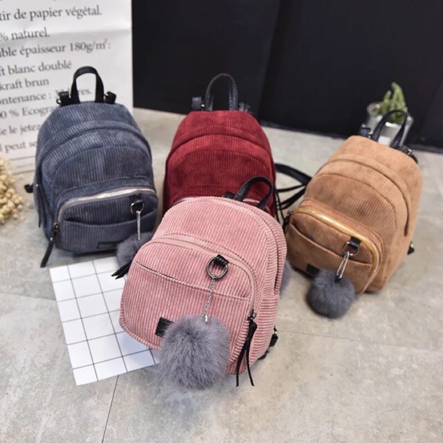 mini backpack with pom pom