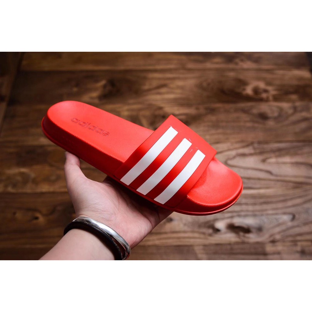 orange adidas slippers