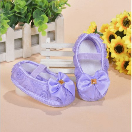 purple baby shoes