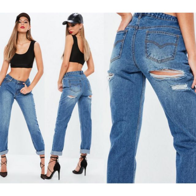 ripped jeans by the bum