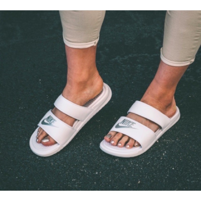 white nike slides women's two strap