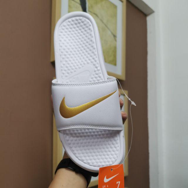 nike swoosh slides