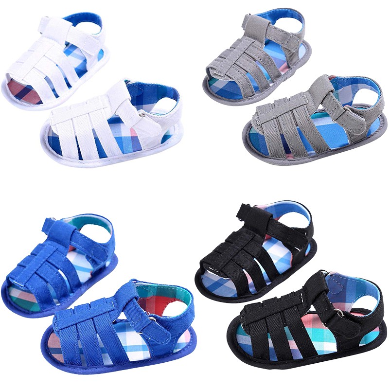 white newborn sandals