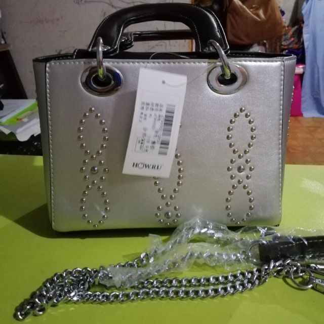 small silver bag with chain