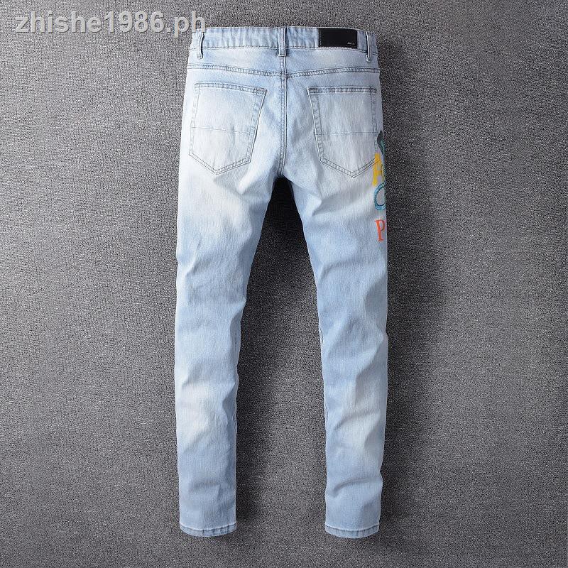 all white amiri jeans