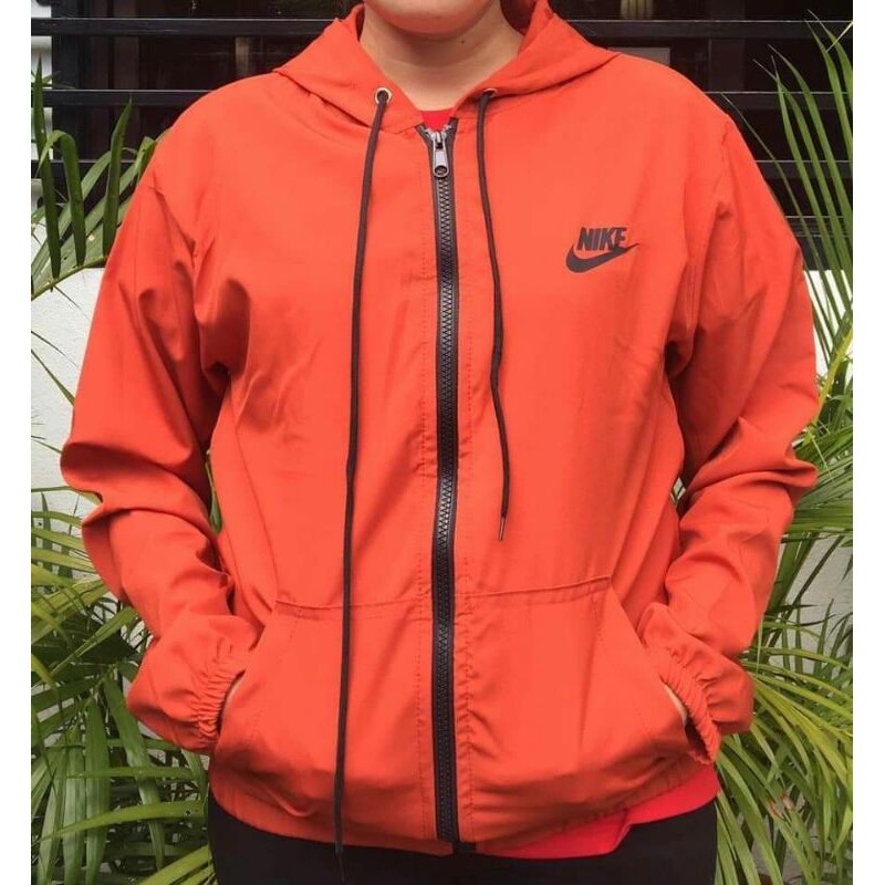 neon orange nike windbreaker