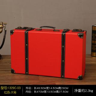 red vintage suitcase