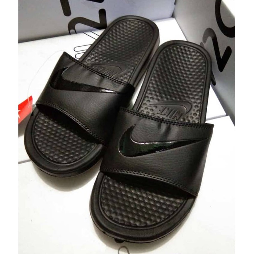all black nike flip flops