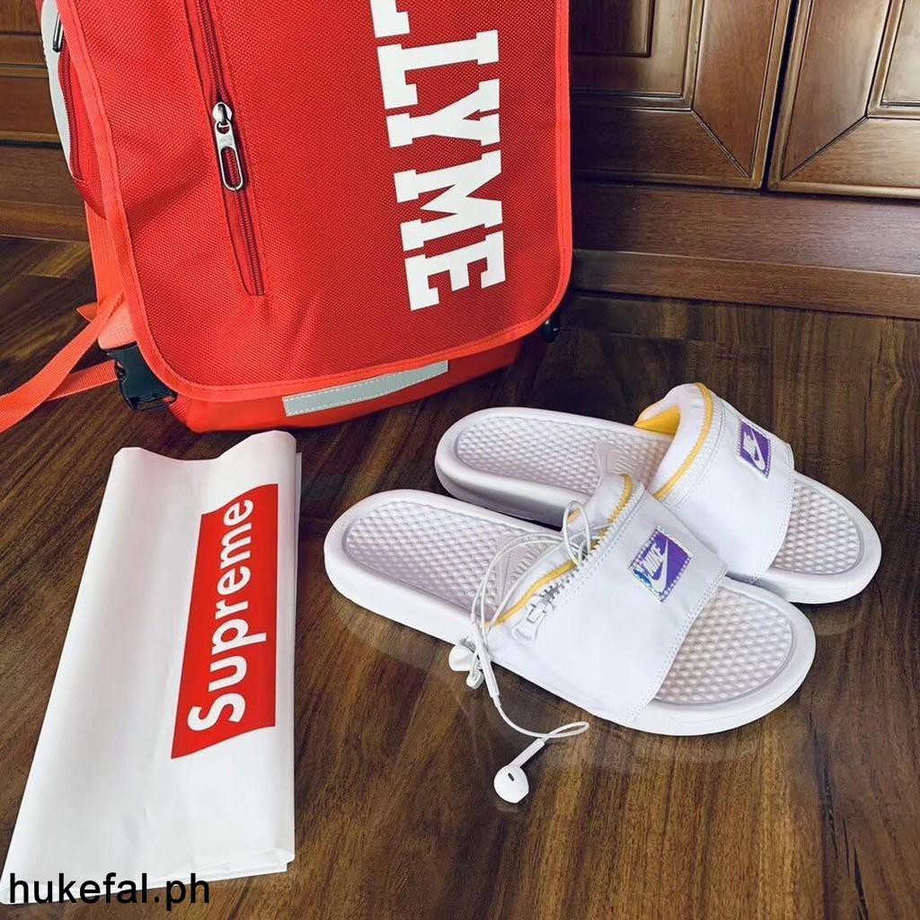 nike benassi zipper slides