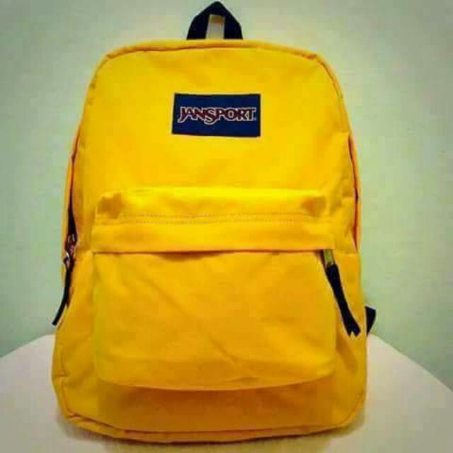 pastel yellow jansport backpack
