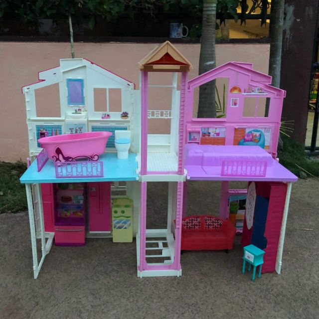 pink passport barbie house
