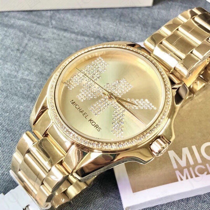 mk watch with mk logo