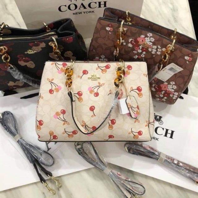 cherry coach purse