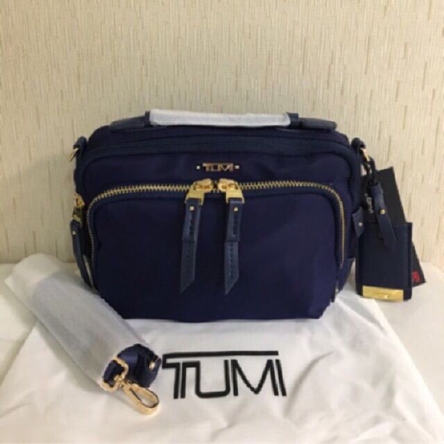 tumi ladies sling bag