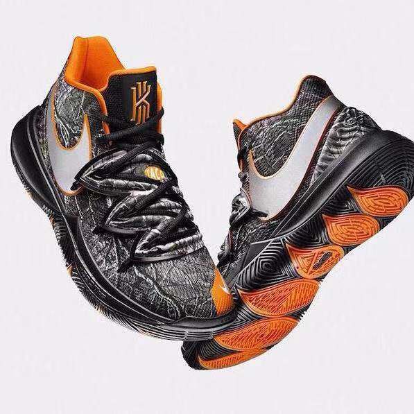 kyrie irving shoes black and orange