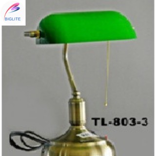 green and gold lamp