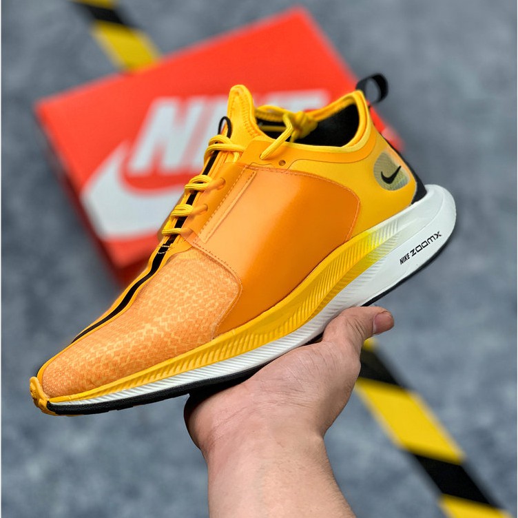 yellow nike running shoes