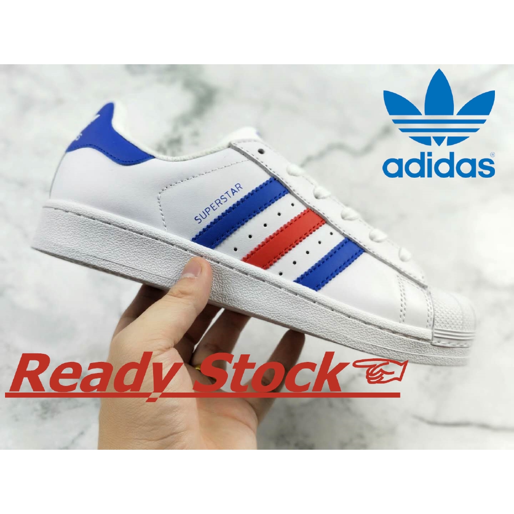 red white and blue adidas superstar